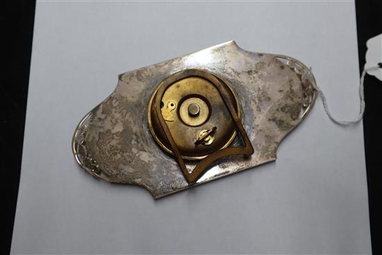 An Art Deco silver and yellow guilloche enamel desk clock with silvered Arabic dial in pierced cartouche mount, Birmingham 1930,